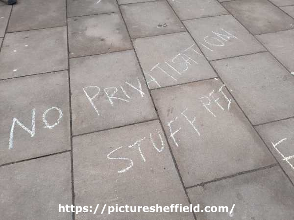 Message on the pavement at a demonstration outside Sheffield Town Hall following the publication of a report by Sir Mark Lowcock into the street trees dispute