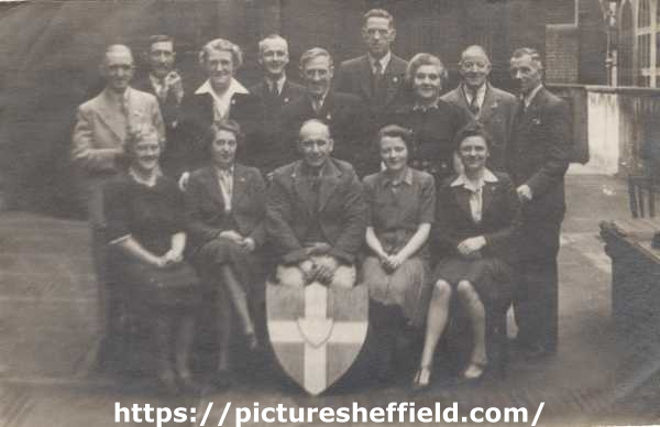 Sheffield Channel Islands Society Committee members, pictured at the side of the Nether Chapel, Sheffield, [1940s]