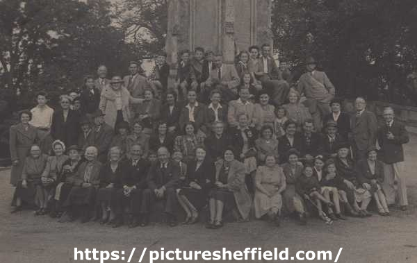 Sheffield Channel Islands Society outing to Ilam, Staffordshire, with members pictured at the foot of Ilam Cross, [c. 1944]