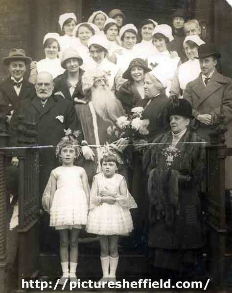 Nurses, children and Santa Claus [possibly Queen Victoria District Nursing Association, Johnson Memorial Home, No. 4 Endcliffe Crescent]