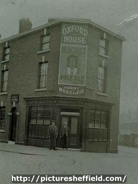 Oxford House public house, Nos. 131 - 133 Moore Street at junction with (right) Clarence Lane