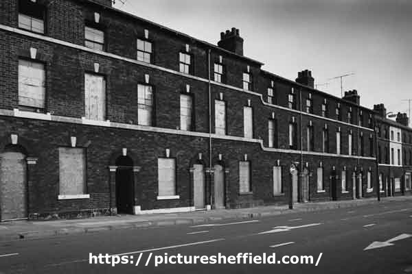 Unidentified boarded up housing
