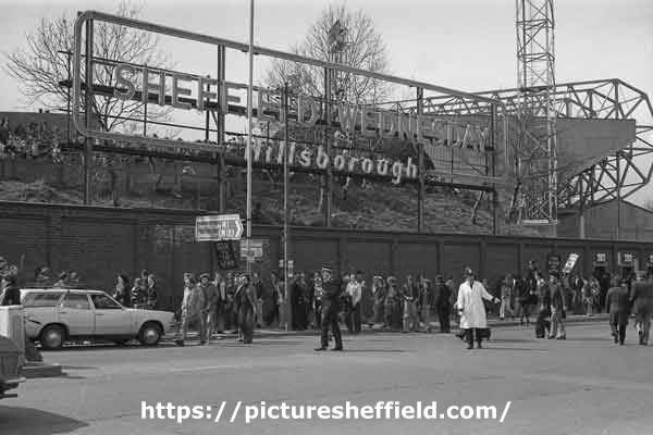 Football supporters arriving for an F.A. Cup semi - final, Hillsborough football ground, Penistone Road North 