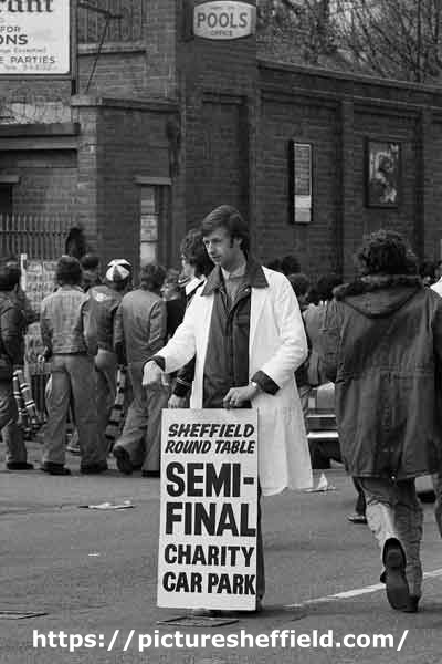 Advertising a charity car park for a football F.A. Cup semi - final, Hillsborough football ground, Penistone Road North 