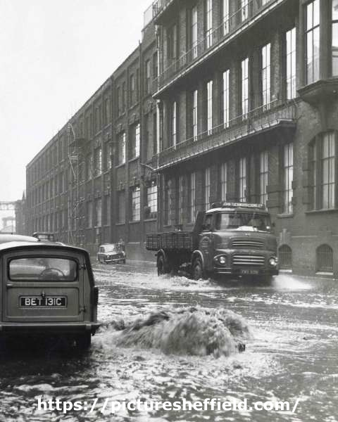 Flooding on Brightside Lane outside English Steel Corporation, 1960s