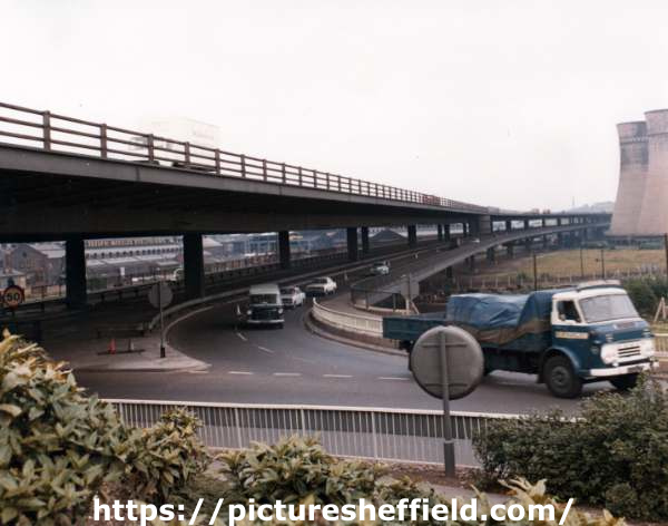 Tinsley Viaduct and the M1 motorway showing (right) the Tinsley Cooling Towers and (left) Osborn Hadfields, (formerly Hadfields Co. Ltd., East Hecla Works), steel founders