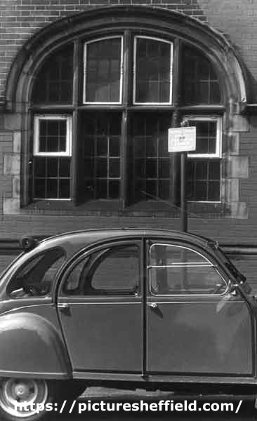 Car outside unidentified building
