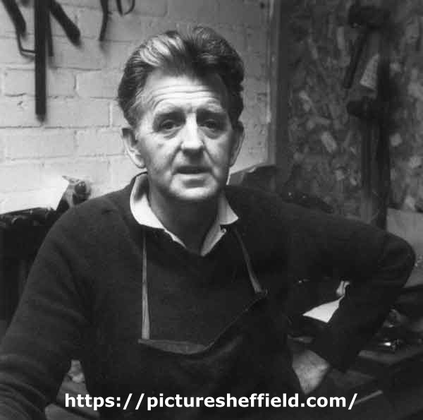 Derek Hinchsliffe, flat hammerman, in his work shop at Draper and Lamb, silversmiths, No. 2 Newton Lane