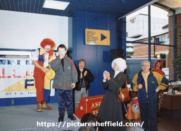 Performing clowns, Pond Street bus station, Sheffield [Transport] Interchange