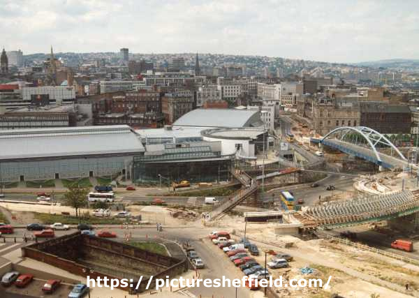 View from Park Hill Flats of Supertram construction on (bottom left) Sheaf Street, (right) Park Square and (centre right) Commercial Street showing (centre left) Ponds Forge Sports Centre