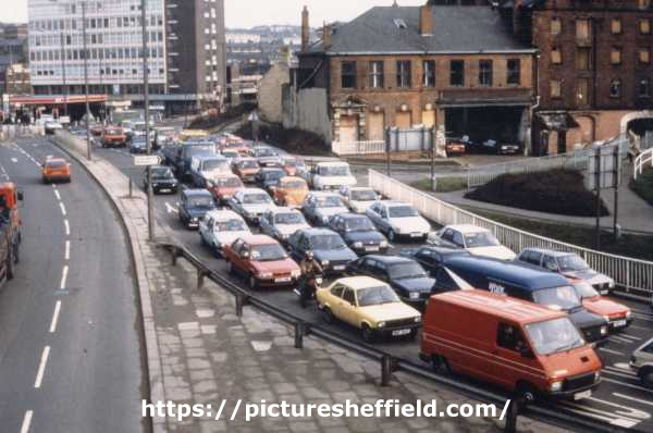 Traffic congestion on Exchange Street (latterly Exchange Place) showing (top right) Canal Wharf Offices, Canal Basin, Wharf Street