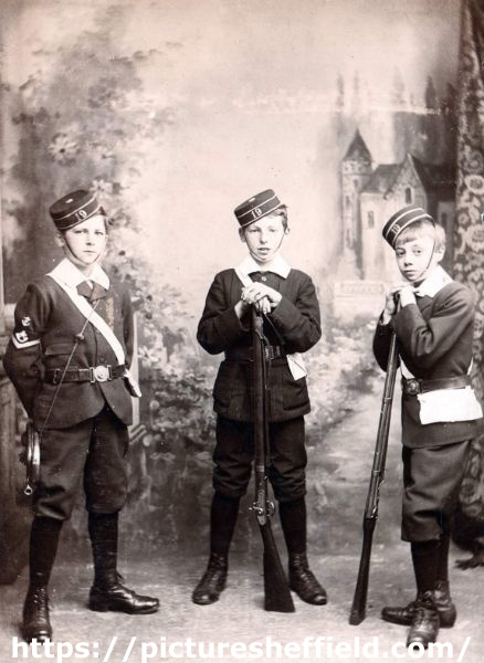 Children in uniform showing (1st left) Lance Corporal Bugler D. Cooke