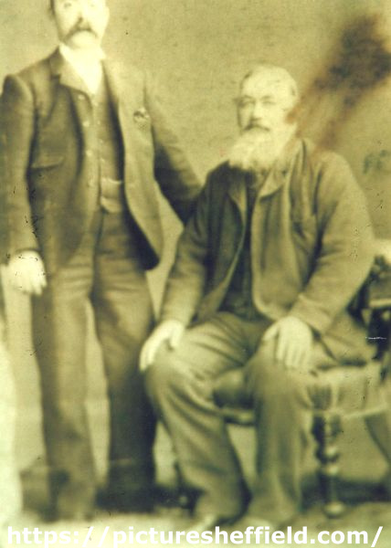 Mr T. E. Cooke (standing) and his father Mr. T. Cooke