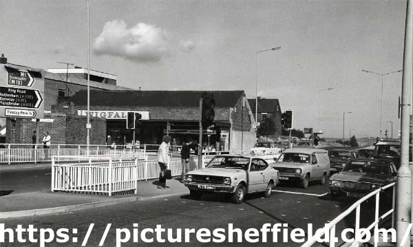 Prince of Wales Road, Darnall at junction with (right) Greenland Road showing (centre) Henry Wigfall and Son Ltd, furniture, television and radio dealers, Nos. 215 - 221 Main Road