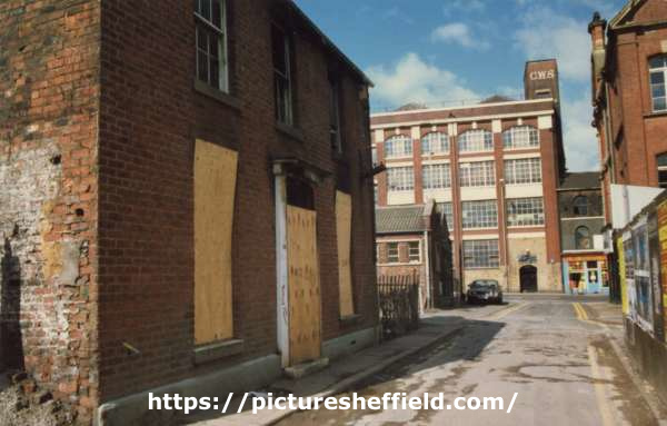 Carver Lane looking towards Cooperative Wholesale Society Ltd., jeans and overall factory, Nos. 70 - 82 West Street