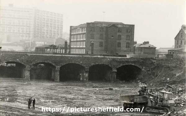 Arches at the Canal Basin showing (centre) the Straddle Warehouse and (top left) Hyde Park Flats 