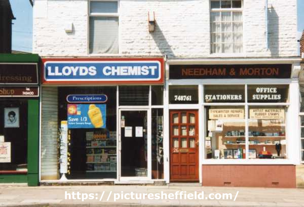 Abbey Lane, No. 28 Lloyds Chemist and No. 26 Needham and Martin, stationers and office supplies