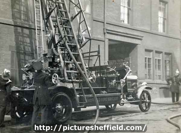 Fire engine with extended ladders outside William Marples and Sons, Hibernia Works, Edge Tool Manufacturers, Westfield Terrace, Division Street