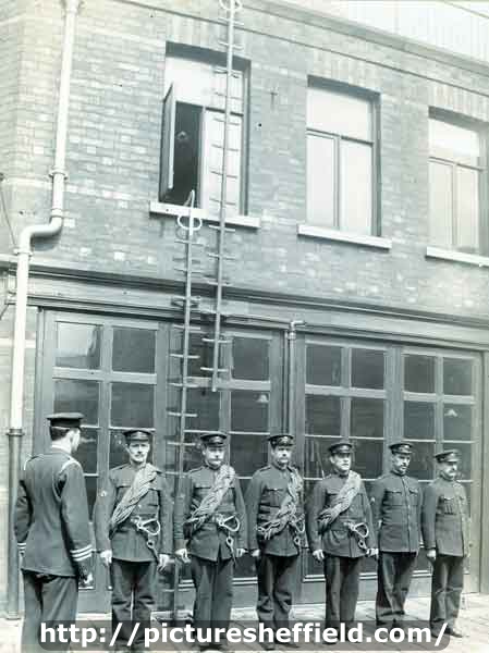 Rockingham Street Fire station showing training exercise in life saving using pompier ladders and lines 