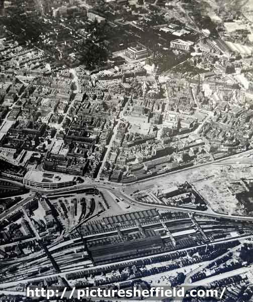 Aerial view of City Centre showing foreground) Sheffield Midland railway station and Sheaf Square