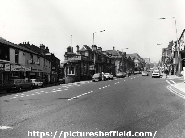 Glossop Road looking towards (left) Convent Walk showing Cosmopolitan Restaurant, Nos, 5 -7 Leadbetter and Peters, opticians and (centre) Barclays Bank, Nos. 207 - 211 Glossop Road