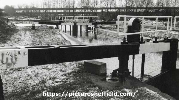 Lock gates on the Sheffield and South Yorkshire Navigation at Tinsley showing (top) the Tinsley Viaduct