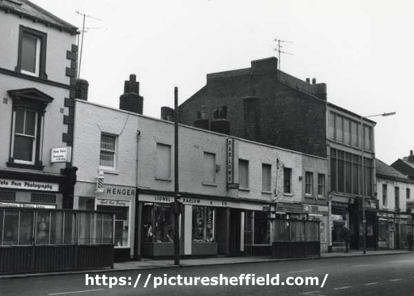 Shops on West Street showing (l.to r.) No. 155 Foto Fare, photographic developing and printing, No. 157 T. Henger, barbers, Nos.159 - 163 Lionel Darlow Ltd., sports shop and No. 167 Arthur Davy and Sons