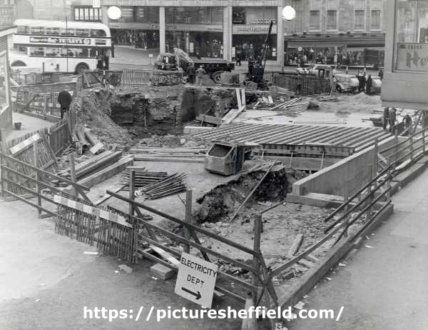 Construction of Castle Square (also known as The Hole in the Road) looking towards Peter Robinson Ltd., fashion department store, Nos. 51 - 57 High Street