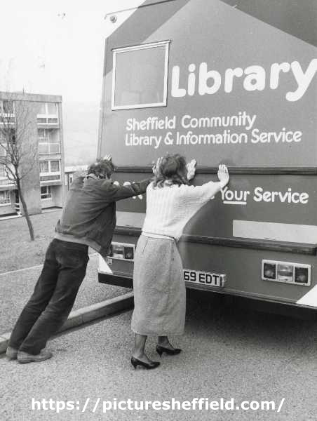 'Bump starting' a mobile library showing (left) librarian, Keith Morris