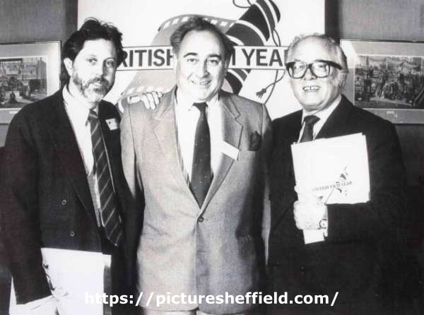 Paul Archer (centre), one time manager of the Odeon and Gaumont Cinemas with (left) David Puttnam and (right) Sir Richard Attenborough at event associated with British Film Year 1985