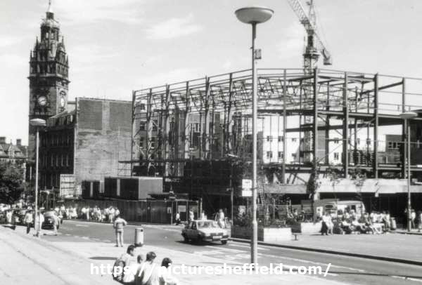 Construction of the Odeon Cinema, Barkers Pool at the junction with (right) Burgess Street