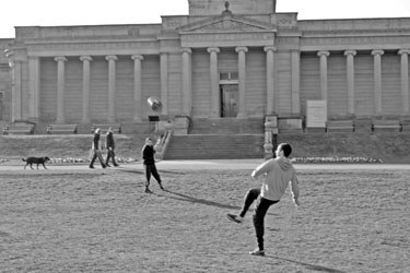 Football game outside Mappin Art Gallery, Weston Park