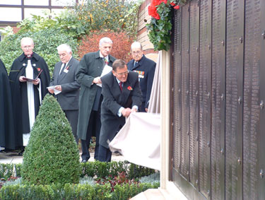 Mr J. Cornell of the Railway Heritage Trust, unveiling a commemorative plaque at the rededication of the Great Central Railway War Memorial, Royal Victoria Hotel