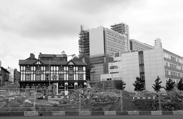 Howard Hotel, No. 57 Howard Street and (right) Hallam University during rebuilding work on Sheaf Square