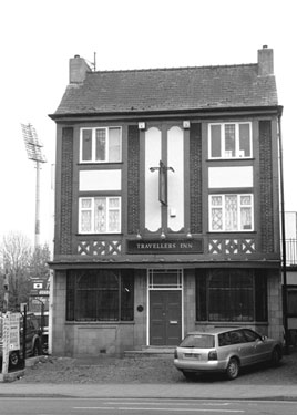 Travellers Inn, No. 784, Attercliffe Road with the floodlights from Don Valley Stadium in the background