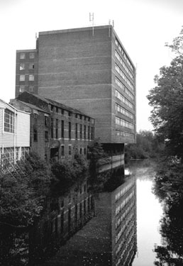 View north along the River Don from Cobweb Bridge, Five Weirs Walk, Sussex Street showing derelict property at the rear of the former Don Saw Mill and Nos. 74-90 Saville House, Savile Street