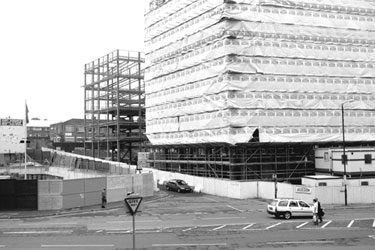 Construction of the Metis Office Building, West Bar showing John Osborne, cutlery manufacturer, Solly Street (right)