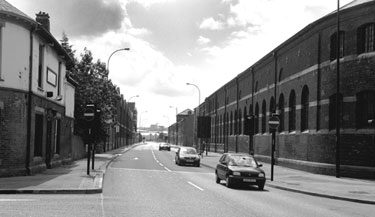 General view of Savile Street East, Attercliffe with Gripple Ltd. occupying West Gun Works the former premises of Thomas Firth and Sons (right) and Bronx formerly the Norfolk Arms public house (left)