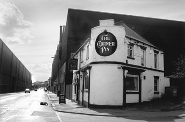 The Corner Pin public house, No. 235 Carlisle Street East at the junction with Lyons Street, looking towards the former premises of Firth Browns Co. Ltd., Atlas Works (left) and Firth Brown Tools Ltd (right)