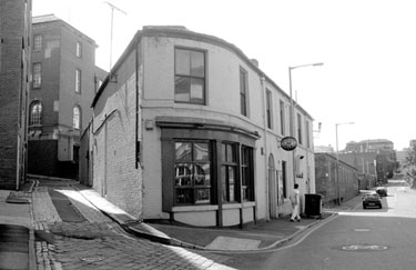 Nos. 89 Trippets Wine Bar (formerly the premises of Bowler J. Dewsnap Ltd., cutlery materials manufacturers, Trippet Lane looking towards Portobello Street showing Penton Street (left)