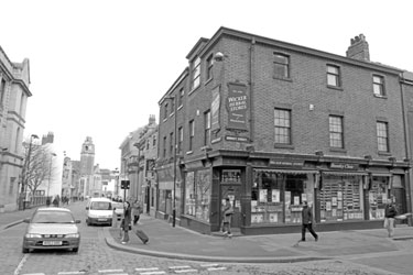 Wicker Herbal Stores on the corner of Surrey Street (No.117) and Norfolk Street looking towards the Victoria Hall