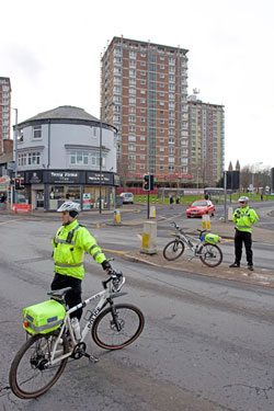 Police Cyclists in attendance for the Chinese New Year Celebrations at the junction of Boston Street London Road with Lansdowne Flats in the background