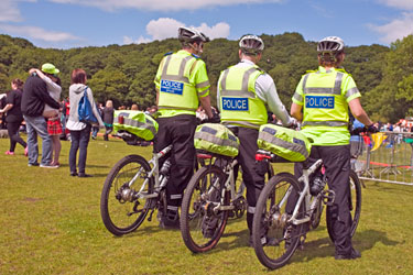 Police officers on bikes in Endcliffe Park during Gay Pride Festival