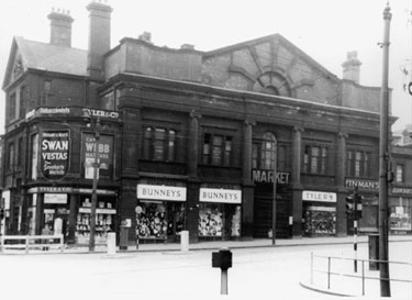 Norfolk Market Hall, Haymarket. Premises include (right-left), No. 28 G.E. Inman, pastry cook, No. 30 H.P. Tyler, boot makers, Nos. 34 - 36 Bunneys (Hosiery) Ltd., drapers, No. 38 Tyler and Co., tobacconists