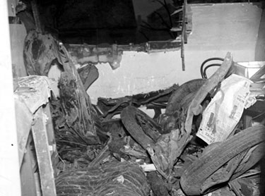 Car flung into attic of a house in Thornsett Road after air raid