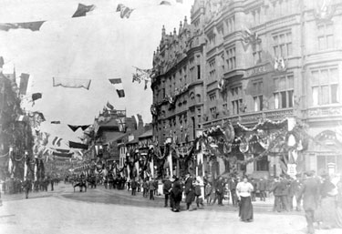 Fargate, decorated for the royal visit of Queen Victoria, Albany Hotel, Yorkshire Penny Bank and Carmel House, right