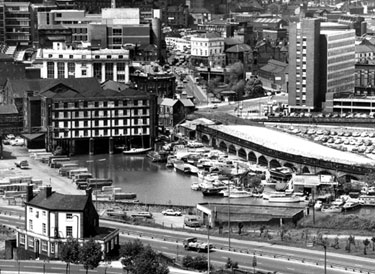 Elevated view from Hyde Park of the Sheffield Canal Basin and surrounding roads and buildings with the Parkway and (foreground) Durham Ox public house, No. 15 Cricket Inn Road