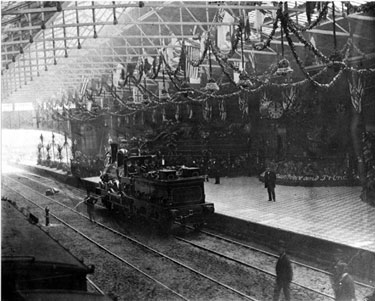 Victoria Station, decorated for the visit of Prince and Princess of Wales (Edward and Alexandra) on midday 16th August 1875 to open Firth Park