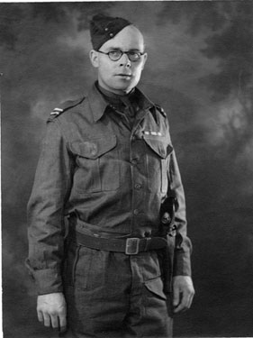 Ernest Revitt Bradley wearing the original dress insignia, commanding officer, Home Guard