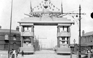 Decorative arch on Savile Street to celebrate the royal visit of King Edward VII and Queen Alexandra, sponsored by John Brown and Co., designed and erected by G.H. Hovey